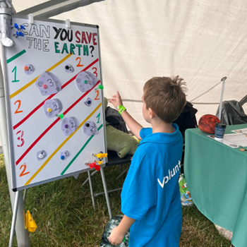 A child at Carfest Festival August 2024 'Saving the Earth from incoming asteroids'